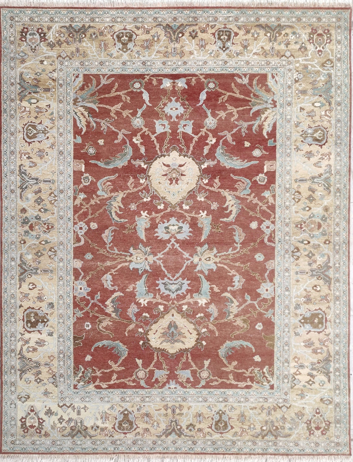 Decorative rug with intricate patterns on a red and beige background
