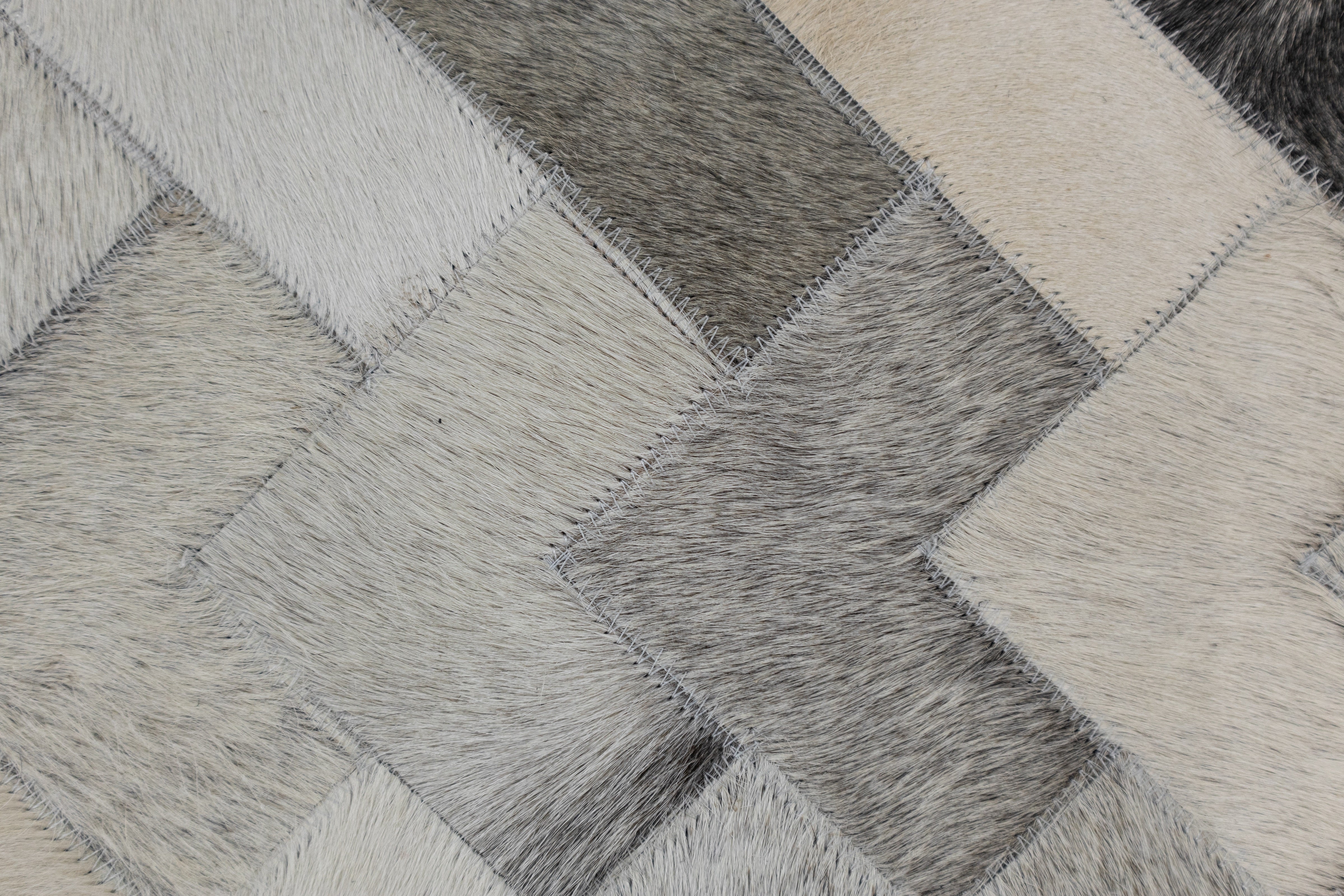 Cortez Multi-Tone Leather Patched Hand-Stitched Rug