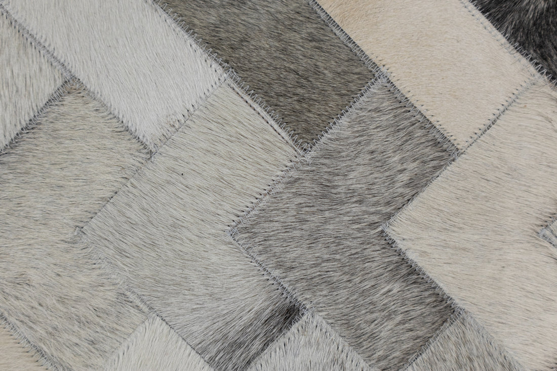 Cortez Multi-Tone Leather Patched Hand-Stitched Rug