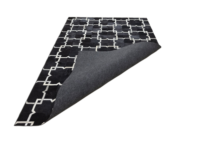 Montis Earth Leather Patched Hand-Stitched Rug